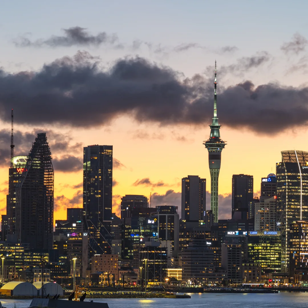 The Auckland skyline at dusk, the Sky Tower among the city towers